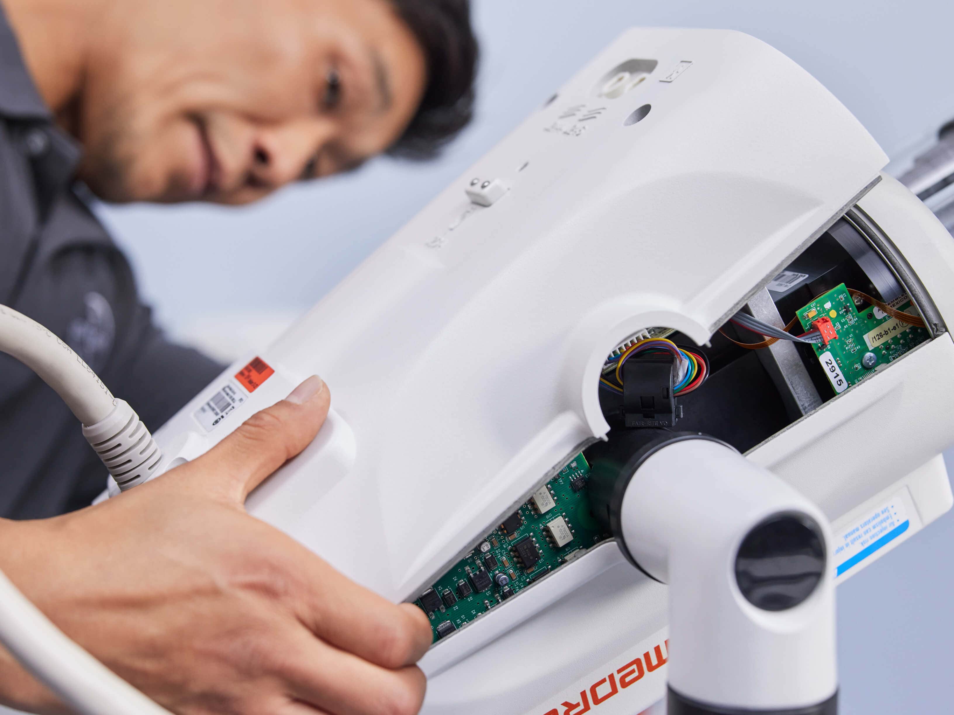 A man doing service of the device
